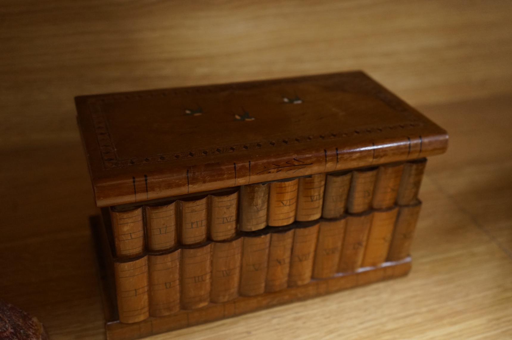 A backgammon games box, Sorrento box, a red wax seal mounted lid and a carved oak floral appliqué, 65cm wide (4)